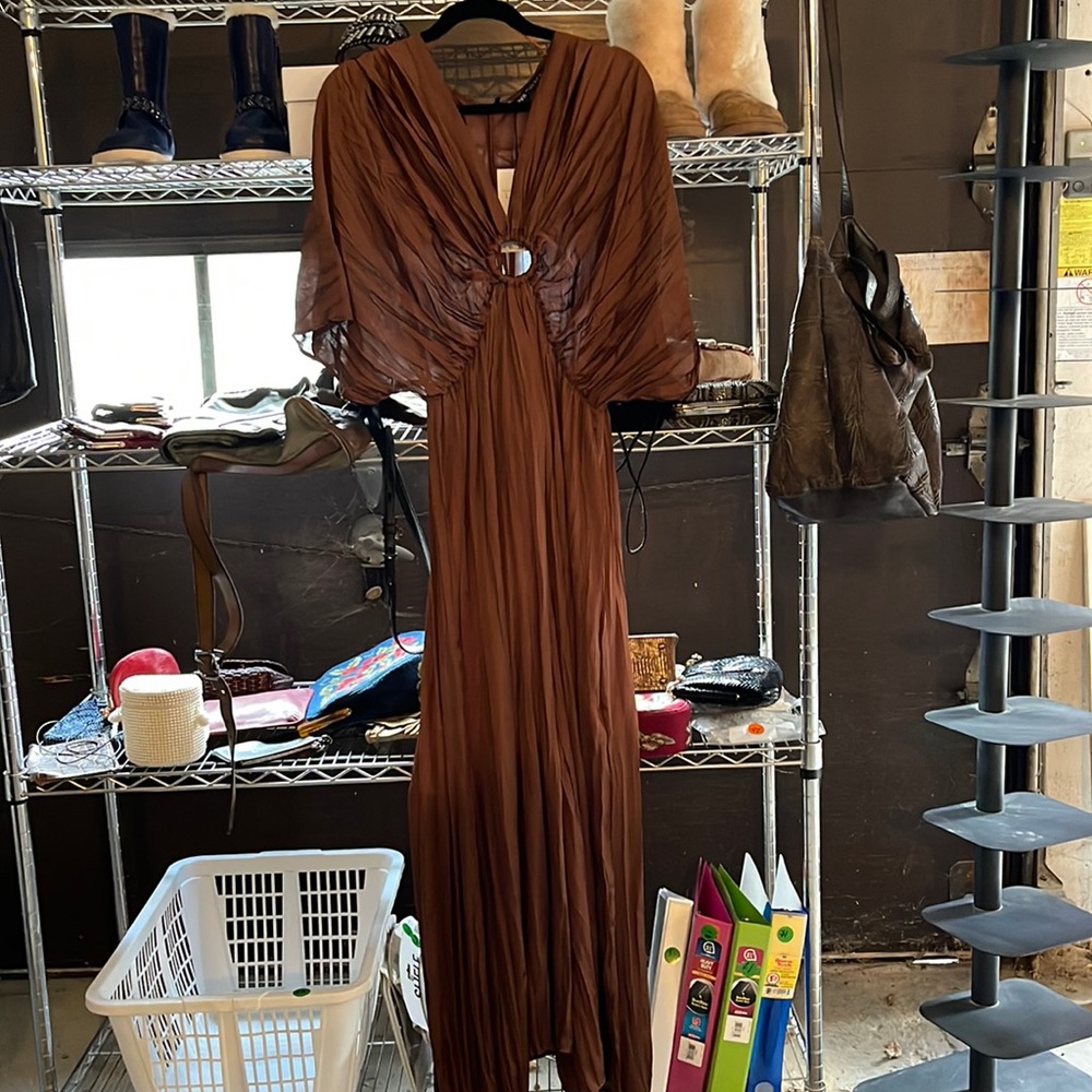 Brand new silky jumpsuit. 100% poly